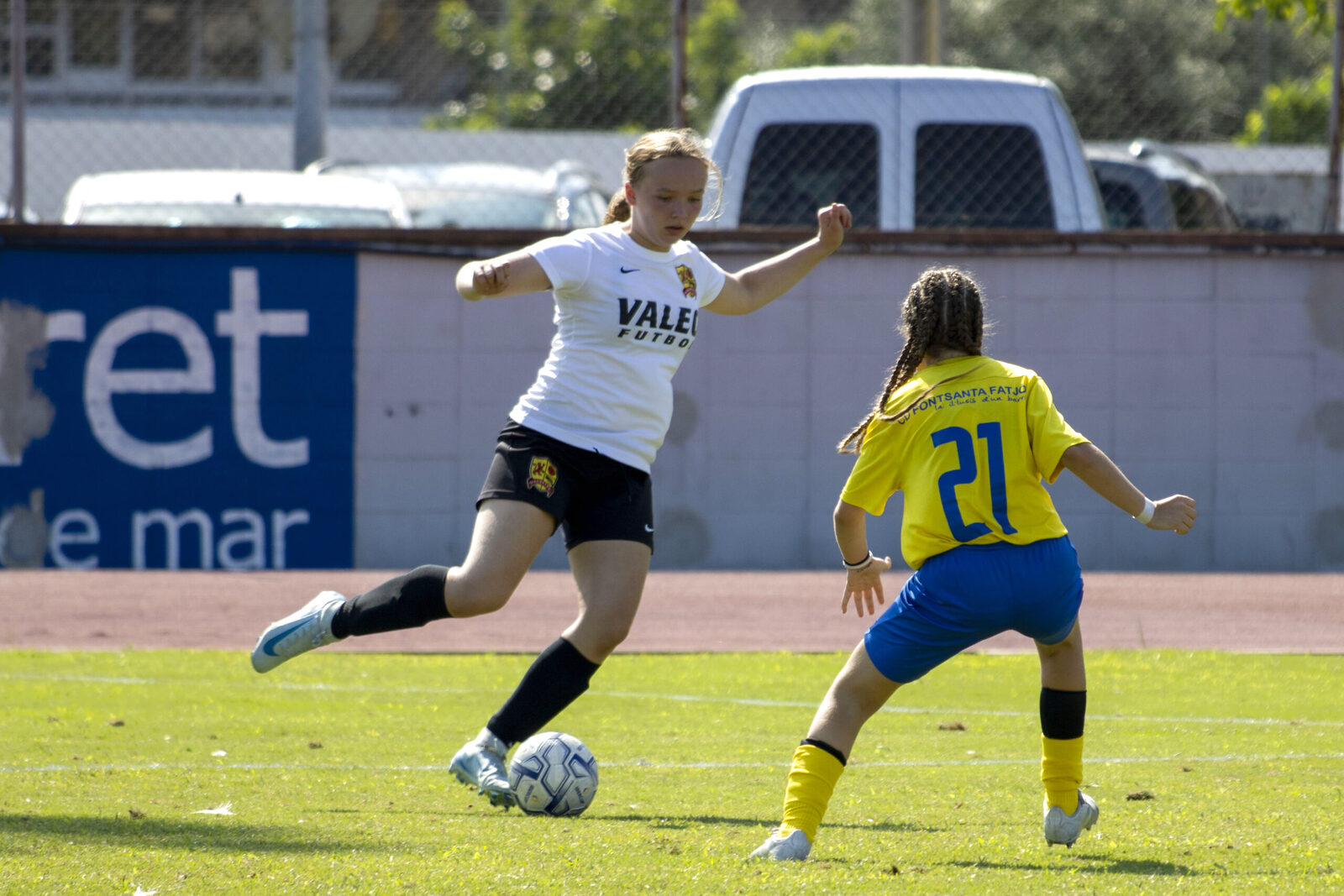 Valeo FC girls program player on the ball