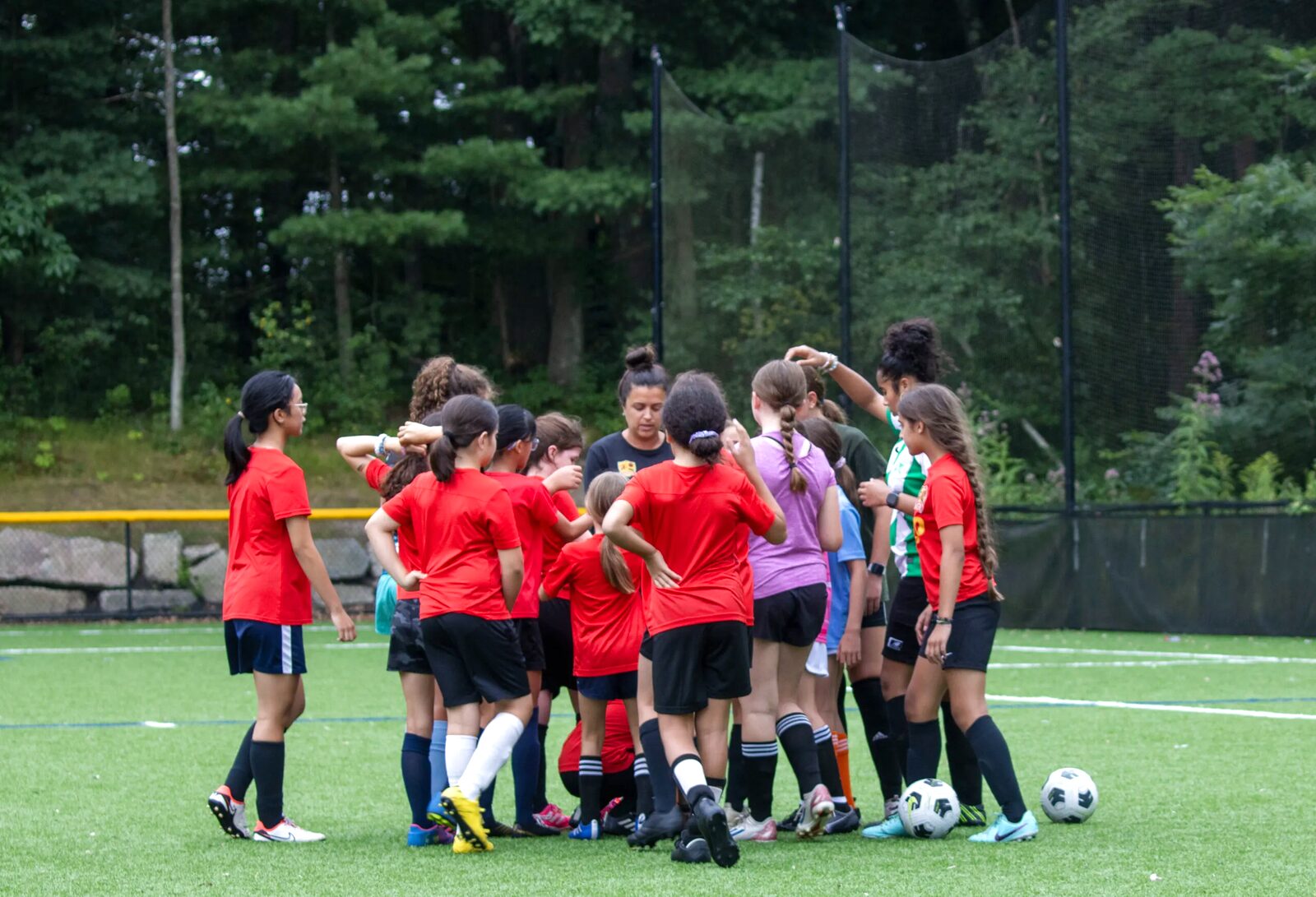 Valeo FC girls team huddle